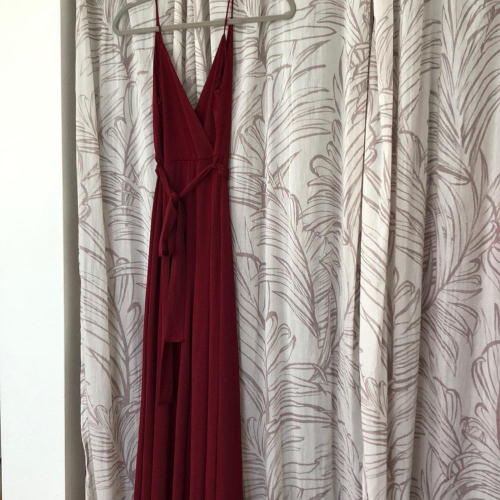 NWOT.   Fashion Nova slit front jumpsuit